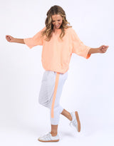 elm-neon-side-tape-3-4-brunch-pants-white-neon-orange-womens-clothing