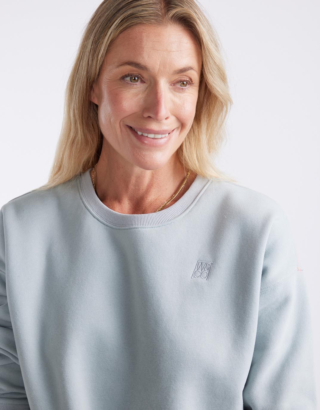 white-co-monogram-fleece-scoop-hem-sweat-light-blue-womens-clothing