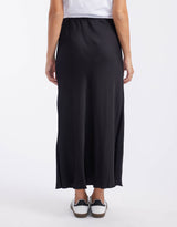 white-co-rosette-skirt-black-satin-womens-clothing