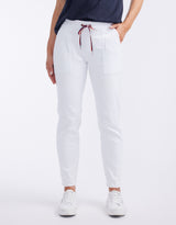 white-co-cara-raw-hem-denim-jogger-white-womens-clothing